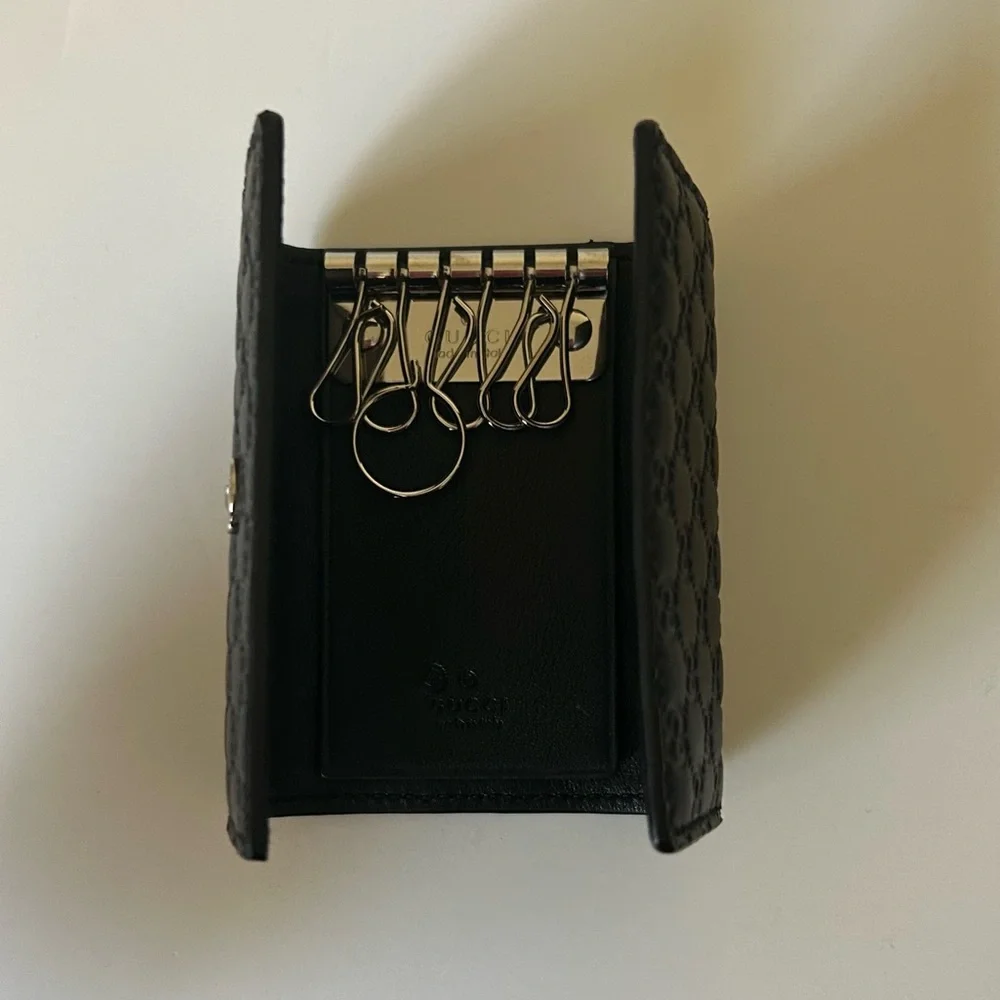 Gucci Black Microguccisima GG Logo Embossed Front closure Leather 6 Key Holder